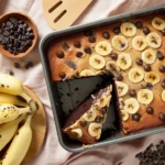 Moist banana chocolate chip cake recipe with melty chocolate chips and banana specks throughout