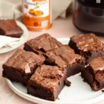 Fudgy chocolate brownies made with just two ingredients - cake mix and pumpkin puree - in an air fryer.two ingredient air fryer brownies photo 1