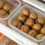 Gluten free protein balls meal prepped in containers