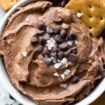 Brownie batter protein dip with graham crackers and salt flakes