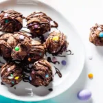 Served cosmic brownie protein bites on a dessert plate