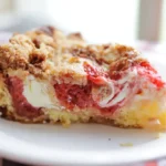 Easy Strawberry Earthquake Cake Recipe slice with cream cheese and coconut