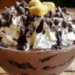 Choco-Chill Cheesecake Ice Cream Bliss dessert bowl with whipped topping and chocolate drizzle