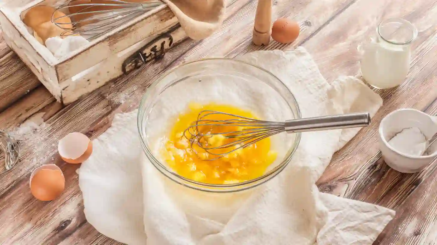 combine-wet-ingredients-carrot-cake Mixing wet ingredients for pineapple carrot cake