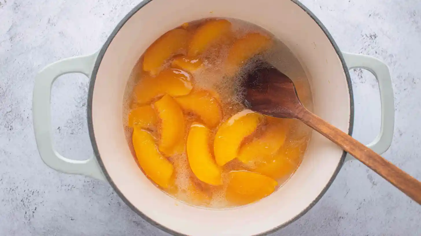 cooking-peach-filling-for-twinkies Cooking peach filling in saucepan for pound cake Twinkies