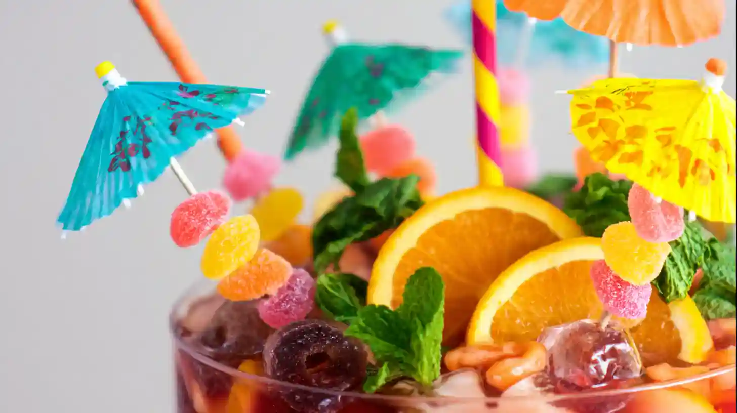 garnishing-fun-bucket-punch-Magic garnishing party punch with umbrellas and fruit