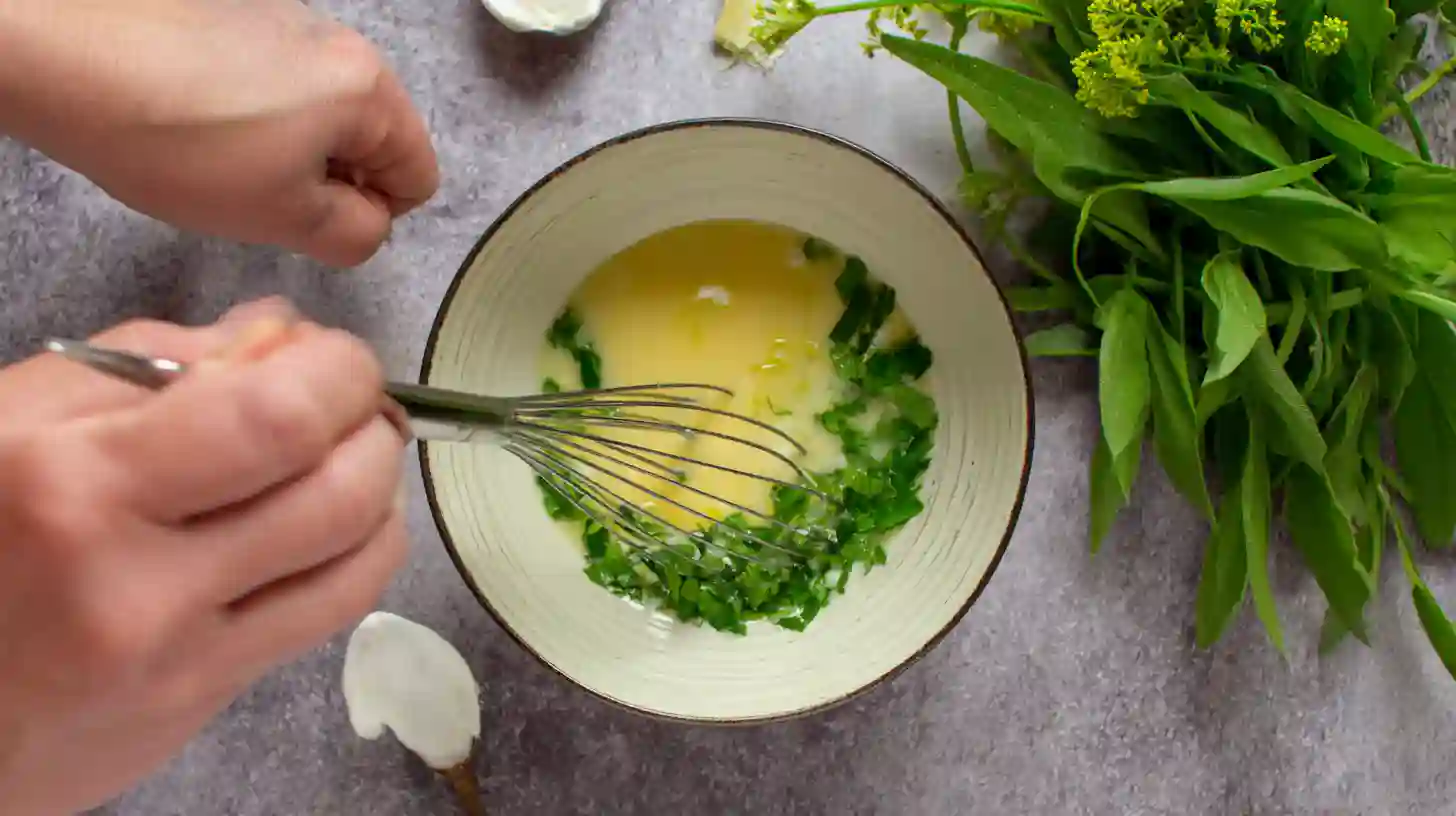 lime-cilantro-sauce fresh lime cilantro sauce being mixed in bowl