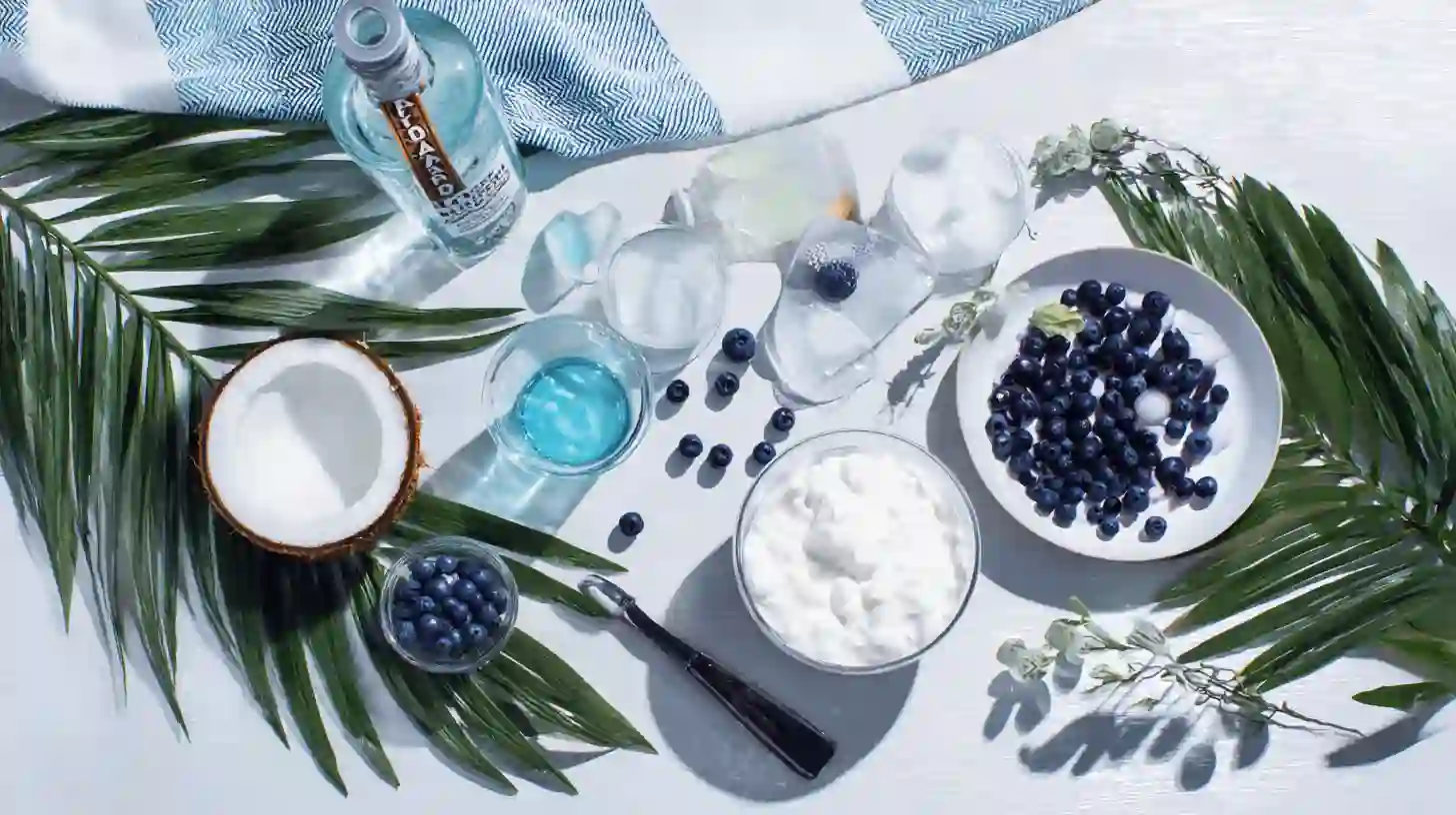 ocean-love-colada-recipe-easy-ingredients Ingredients for Ocean Love Colada Recipe Easy including coconut rum and blue curaçao