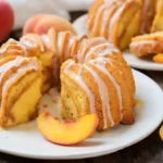 Peach Cobbler Pound Cake Twinkies drizzled with glaze on plate