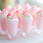 pink pony shots with whipped cream and sprinkles
