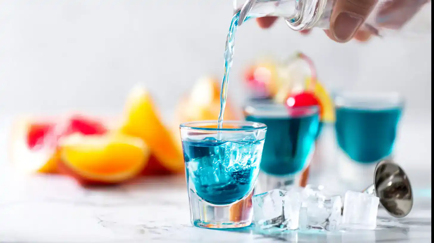 pouring-bikini-bottom-shot pouring bikini bottom punch shot into glass