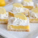 Sliced Lazy Day Lemon Cream Pie Bars ready to serve