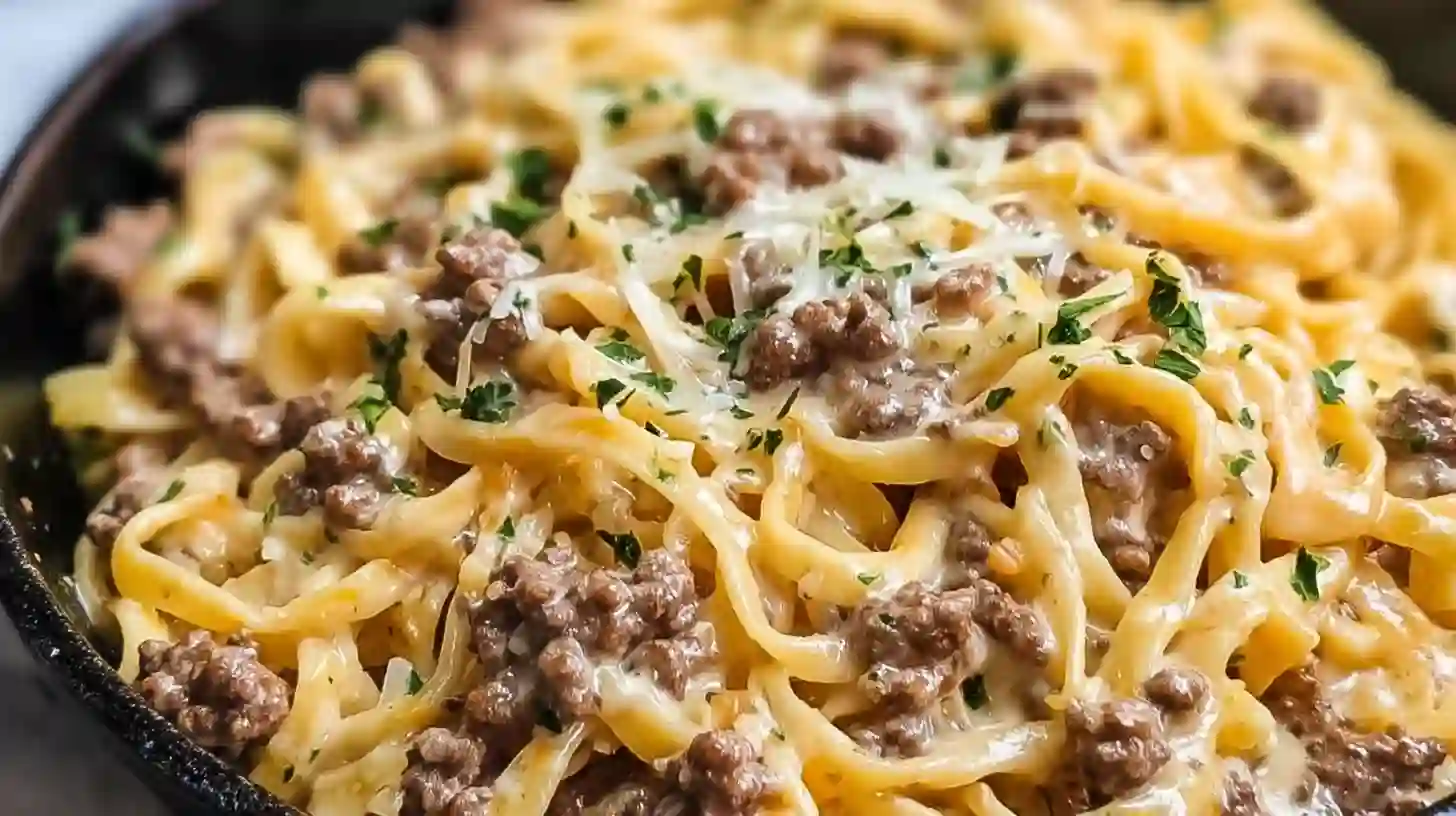 serving-One-Pot-Creamy-Beef-and-Garlic-Butter-Pasta Serving One-Pot Creamy Beef and Garlic Butter Pasta with parsley and parmesan