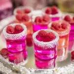served Wednesday Pink Panic Shots on a mirrored tray with toppings