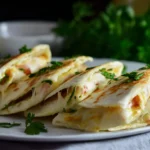 Served Simple Cheesy Garlic Chicken Wraps with parsley