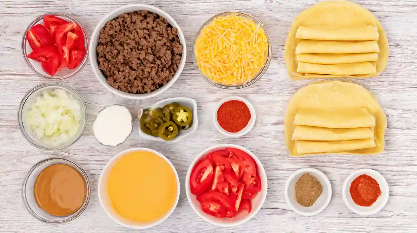 simple-crispy-nacho-egg-rolls-Recipe-ingredients Ingredients for Simple Crispy Nacho Egg Rolls Recipe laid out in bowls