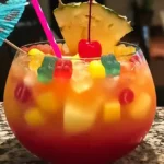 Real Sunset Beach Bucket Blast cocktail with pineapple and candy