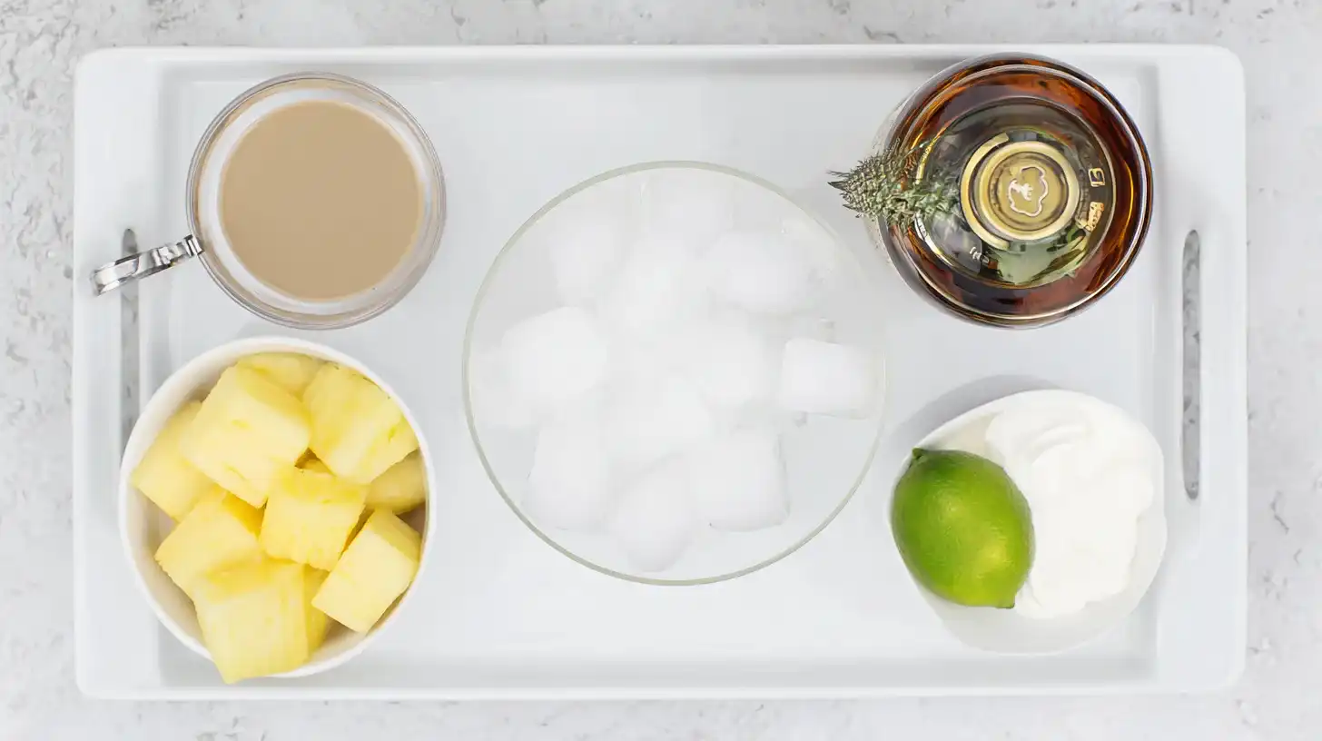 tropical-baileys-colada-bliss-ingredients Ingredients for Baileys Colada Bliss on tray