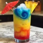 Real Twister in a Cup Cocktail with red, blue, yellow layers