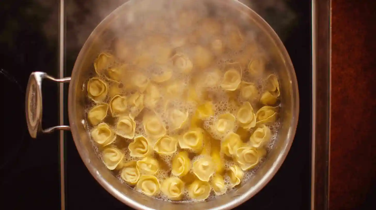 boiling-cheese-tortellini Cheese tortellini boiling in salted water in a large pot.high-protein meals for muscle gain