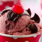 Finished Cherry Coke Ice Cream scoops with cherry.summer dessert ideas