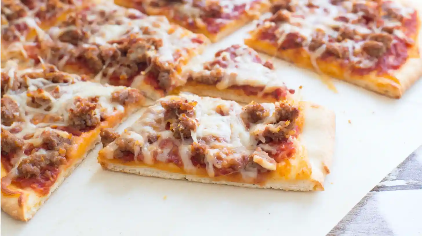 cool-serve-homemade-school-pizza-Recipe Sliced Homemade School Pizza Recipe resting before serving