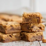 Easy Butterscotch Toffee Cookie Bars stacked and warm