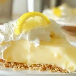 Slice of Easy Cream Cheese Lemonade Pie with whipped cream