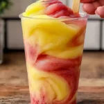 Layering and swirling fruit slush – best pineapple strawberry swirled slushies recipe for healthy smoothie recipes
