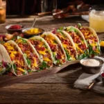 Plated easy loaded bacon cheeseburger tacos – high-protein family dinner with toppings and sauce