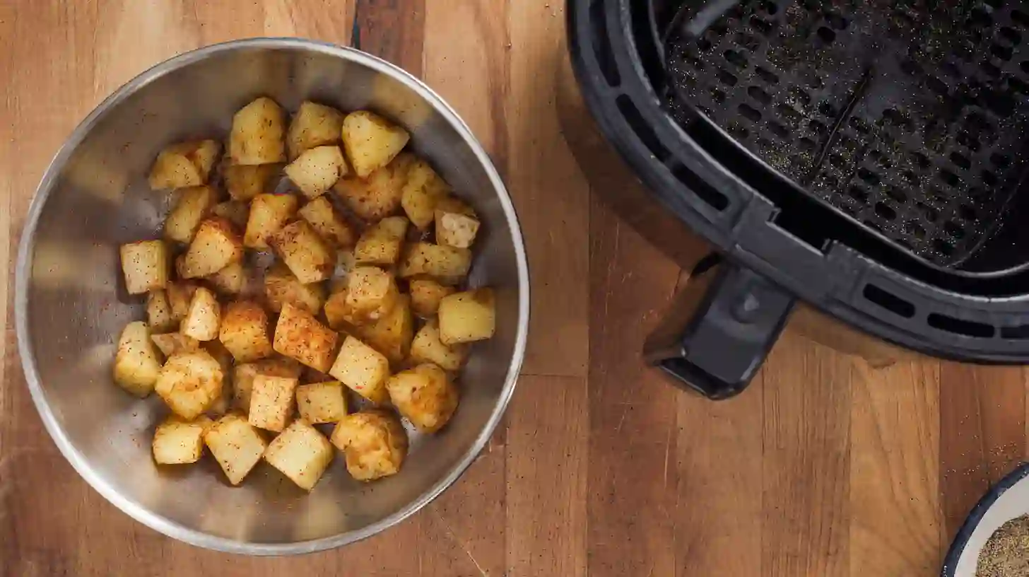 sloppy-joe-potato-skillet-crisp-potatoes Crisping potatoes in air fryer for Sloppy Joe Potato Skillet – budget-friendly family dinner with seasoned potatoes and pantry staples.meal prep for busy moms