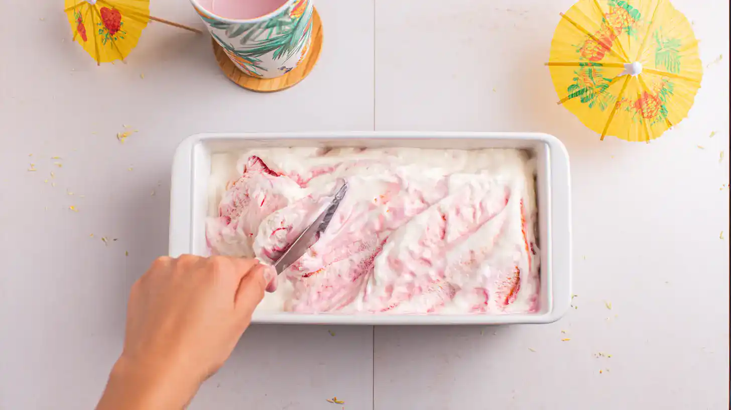 step3-miami-vice-ice-cream-swirl-freeze Layering and swirling Miami Vice Ice Cream – premium ice cream recipe and tropical dessert ideas.family-friendly tropical recipe