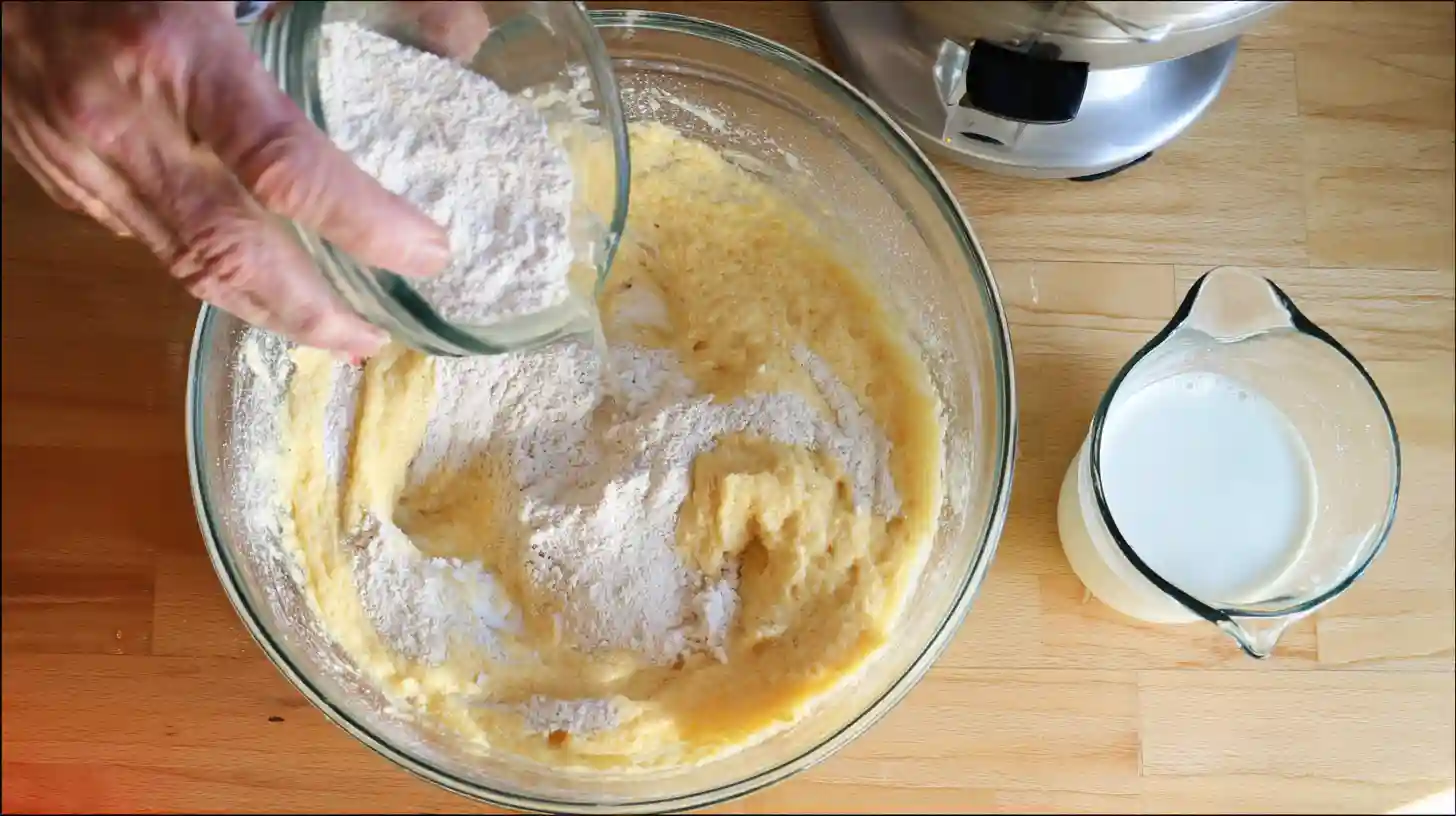 alternate-flour-buttermilk-southern-peach-pound-cake alternating flour mixture and buttermilk for Southern Peach Buttermilk Pound Cake, baking tips for tender texture, quick homemade cakes for parties