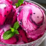 Dragon fruit ice cream homemade with creamy pink scoops and tropical swirls