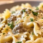 Easy creamy beef and bowtie pasta recipe with ground beef, quick family dinner idea, creamy ground beef pasta skillet, high protein family meal