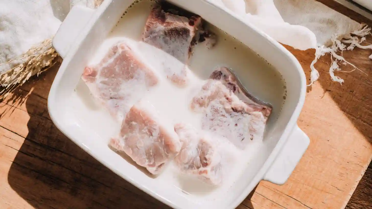 soaking-pork-chops-buttermilk-country-fried-step1 soaking pork chops in buttermilk for crispy fried pork recipe – best comfort food cooking step