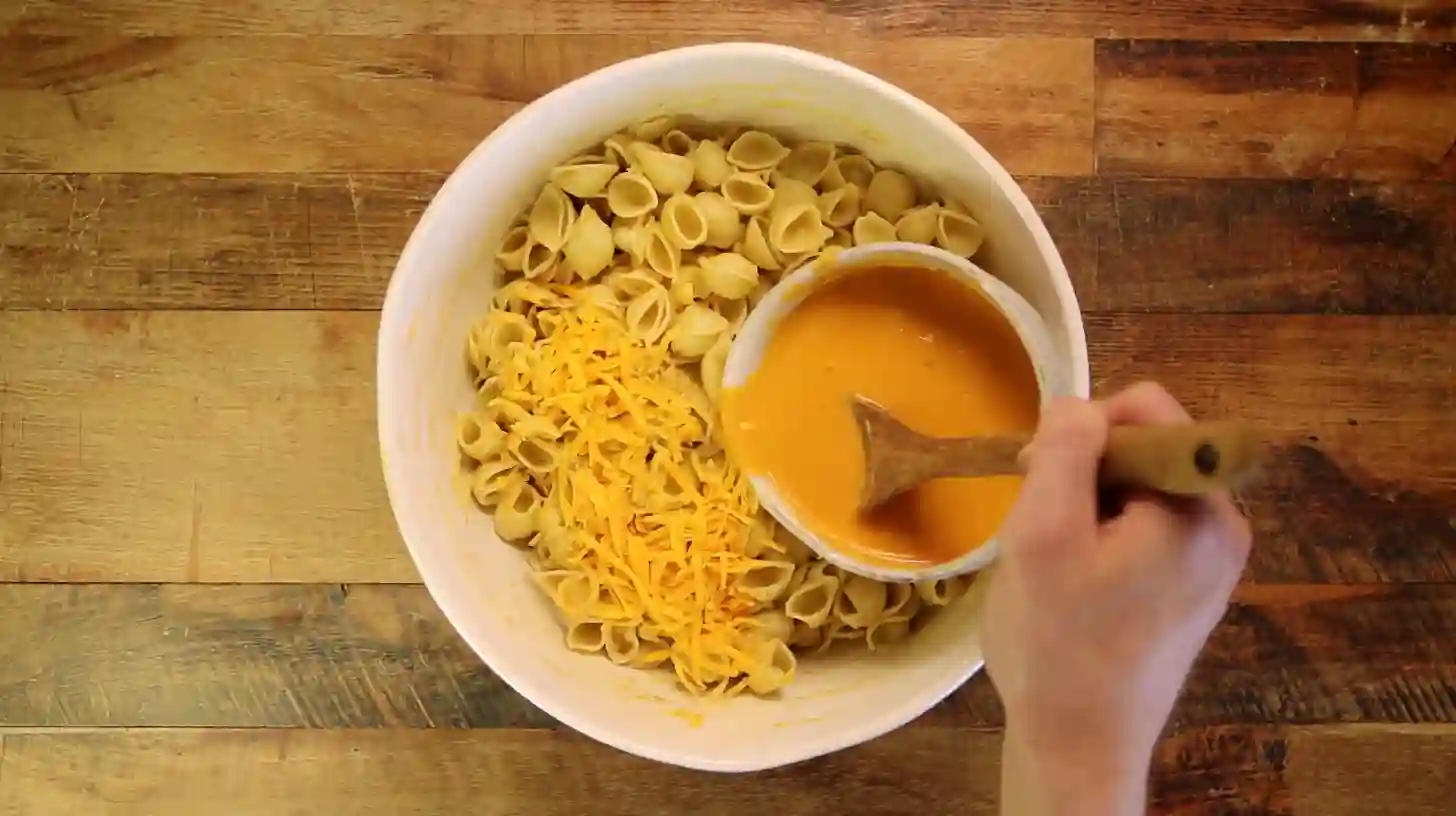 step-3-stir-creamy-cheddar-shells-casserole Step 3: Stir creamy cheddar shells – Meatloaf and Cheddar Shells Casserole Recipe for affordable family dinner recipes