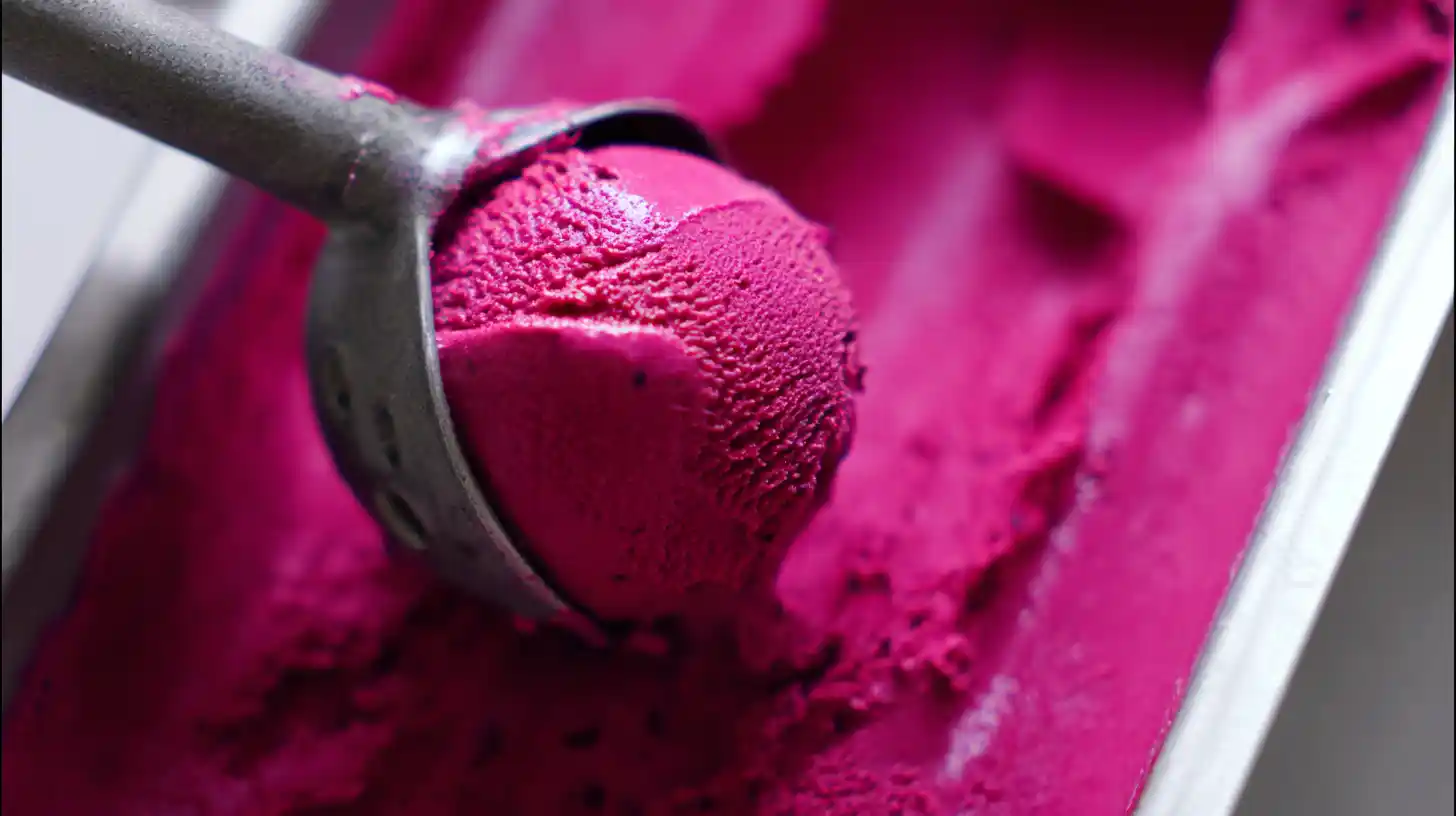 step-5-scooping-dragon-fruit-ice-cream Scooping dragon fruit ice cream homemade, a creamy tropical treat in healthy homemade ice cream recipes