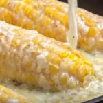 Cheesy Garlic Butter Corn on the Cob recipe in creamy parmesan garlic butter sauce | easy side dishes with corn