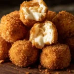 Crab Rangoon Bombs with crispy coating and creamy crab filling, quick and cheap party snacks and crispy fried appetizer recipes