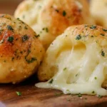 Easy Gooey Mozzarella Biscuit Bombs Recipe – cheesy snack for kids and quick appetizer for parties