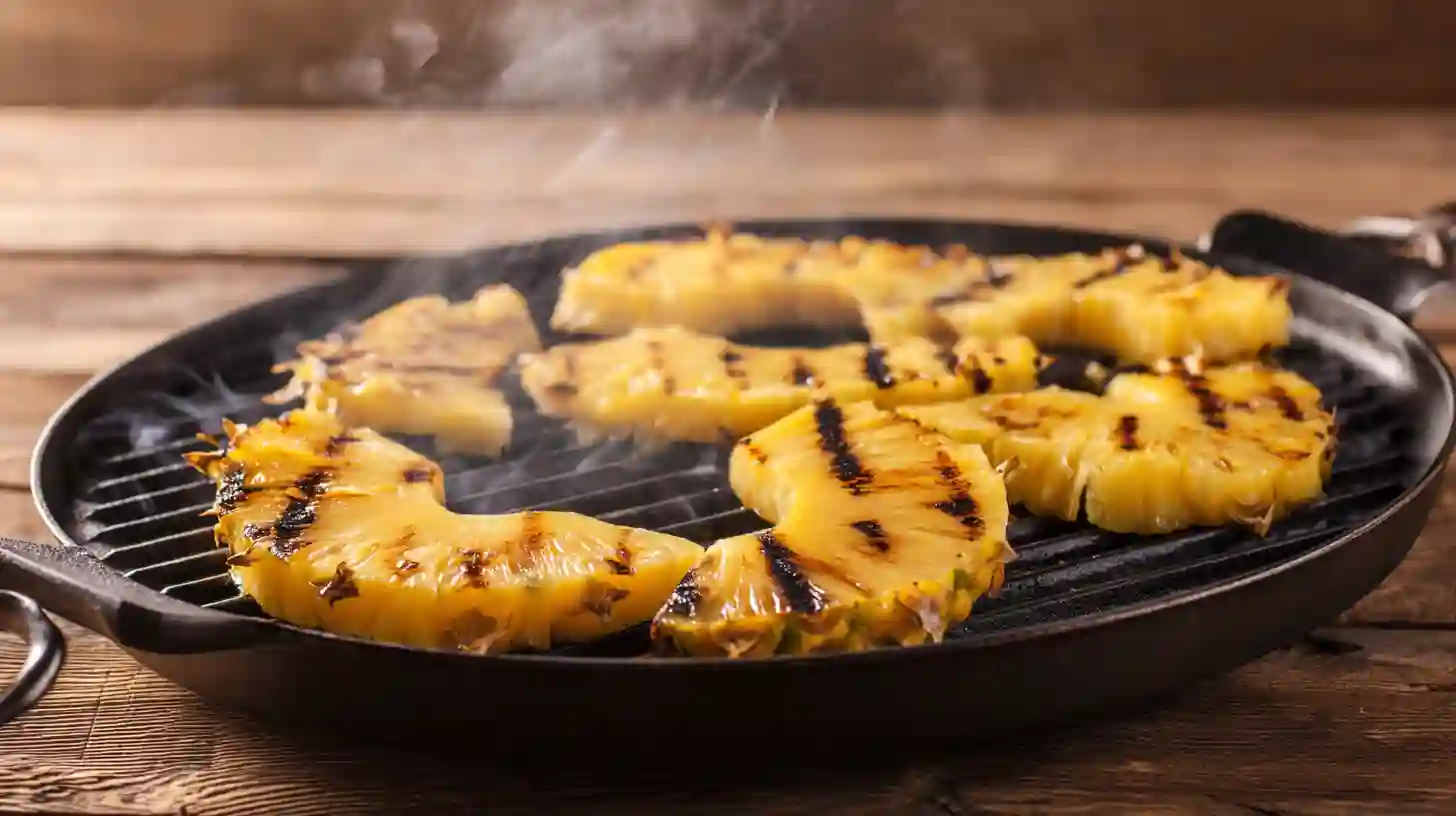 step2-grill-pineapple-teriyaki-tacos Grilling pineapple slices for Teriyaki Chicken Tacos with Grilled Pineapple Pear Salsa – quick family dinner ideas and fresh summer chicken taco recipes.
