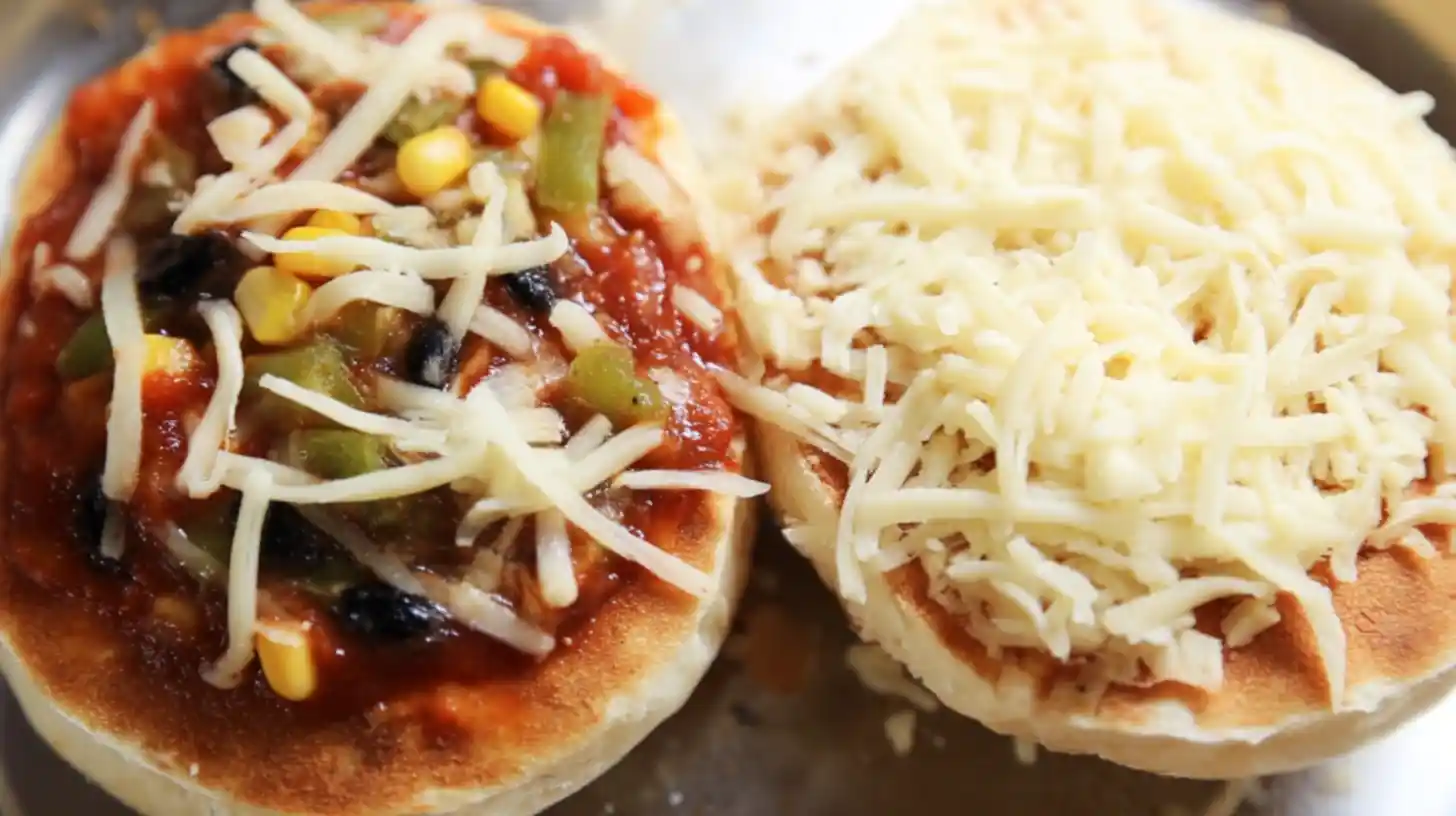 Layering bun pizza without oven with sauce, cheese, and toppings – ideal for quick pizza for kids and easy dinner recipes for families
