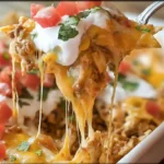 Cheesy Mexican White Trash Casserole for easy weeknight dinners, a creamy Tex-Mex comfort food recipe perfect for budget-friendly family meals.